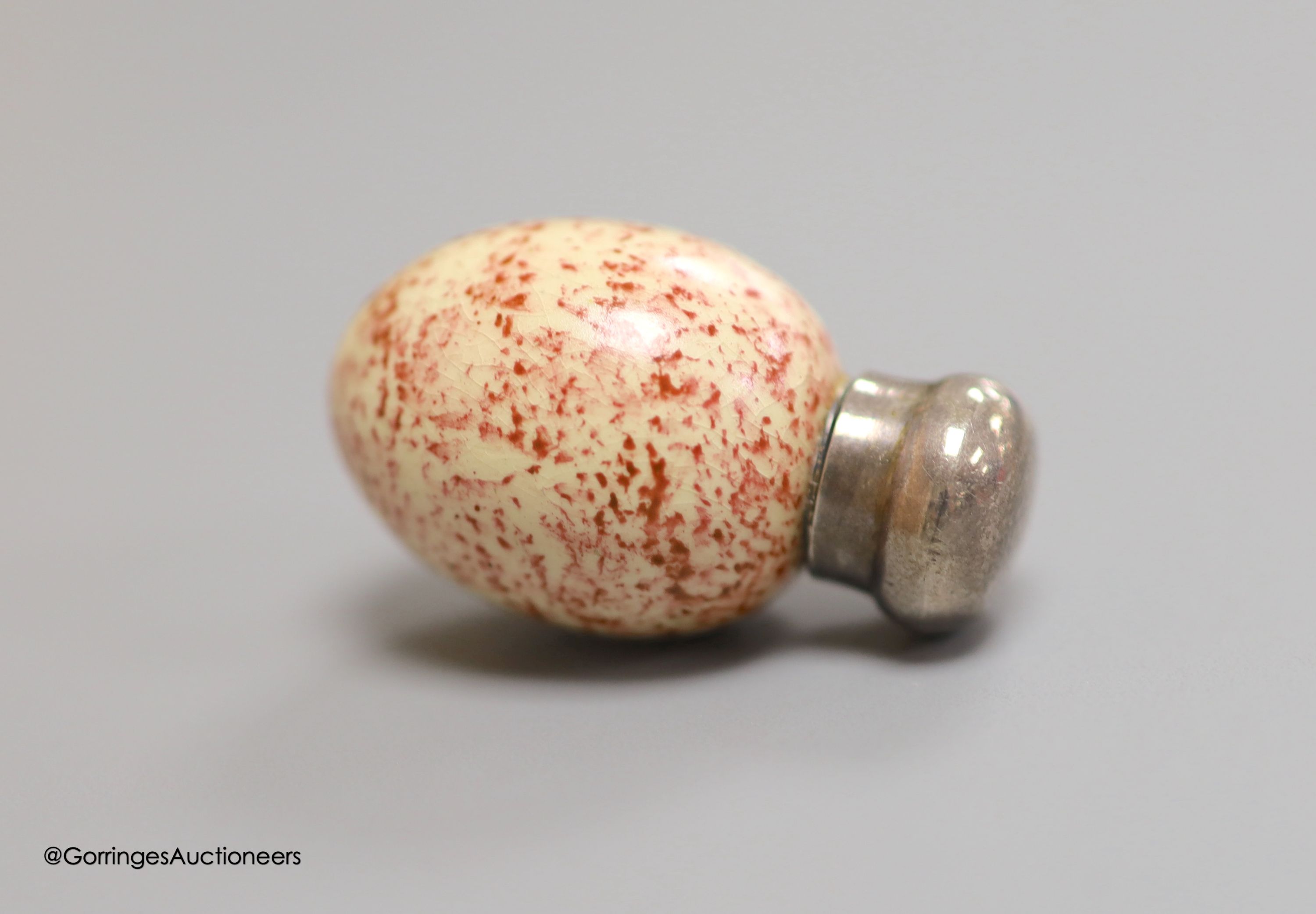 A late 19th/early 20th century silver mounted Macintyre? porcelain egg shaped scent flask, by Saunders & Shepherd, Birmingham, (indistinct date letter), 37mm.